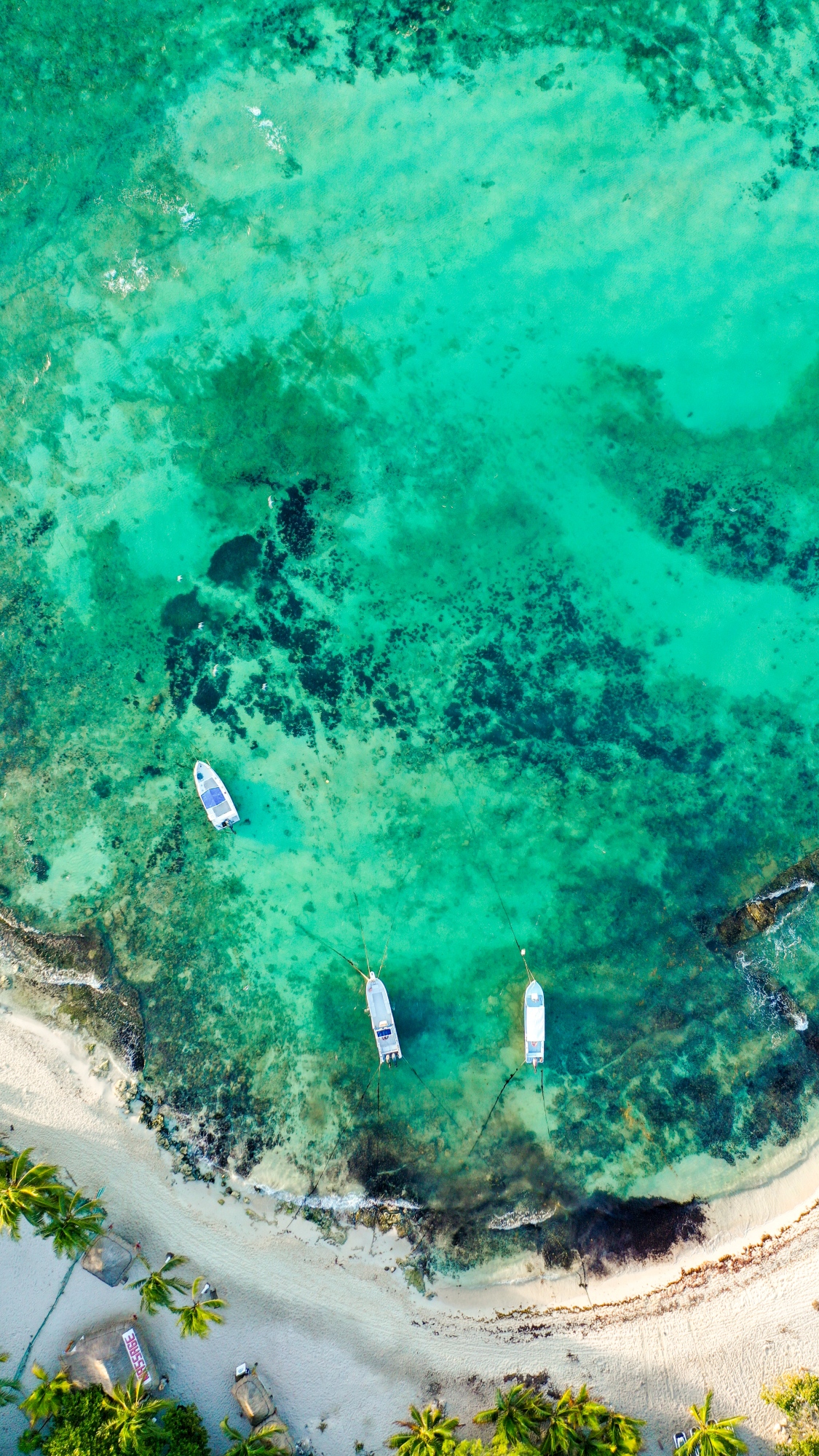 turquoise-ocean-waters-boats-and-tropical-sandy-be-2026-09-22-13-32-39-utc